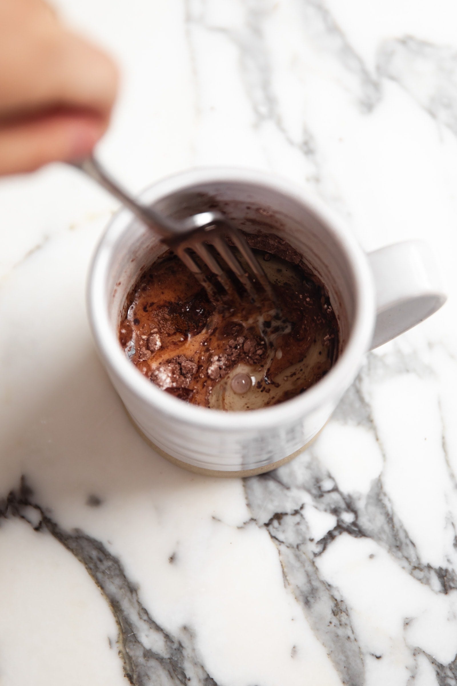 mixing ingredients in mug