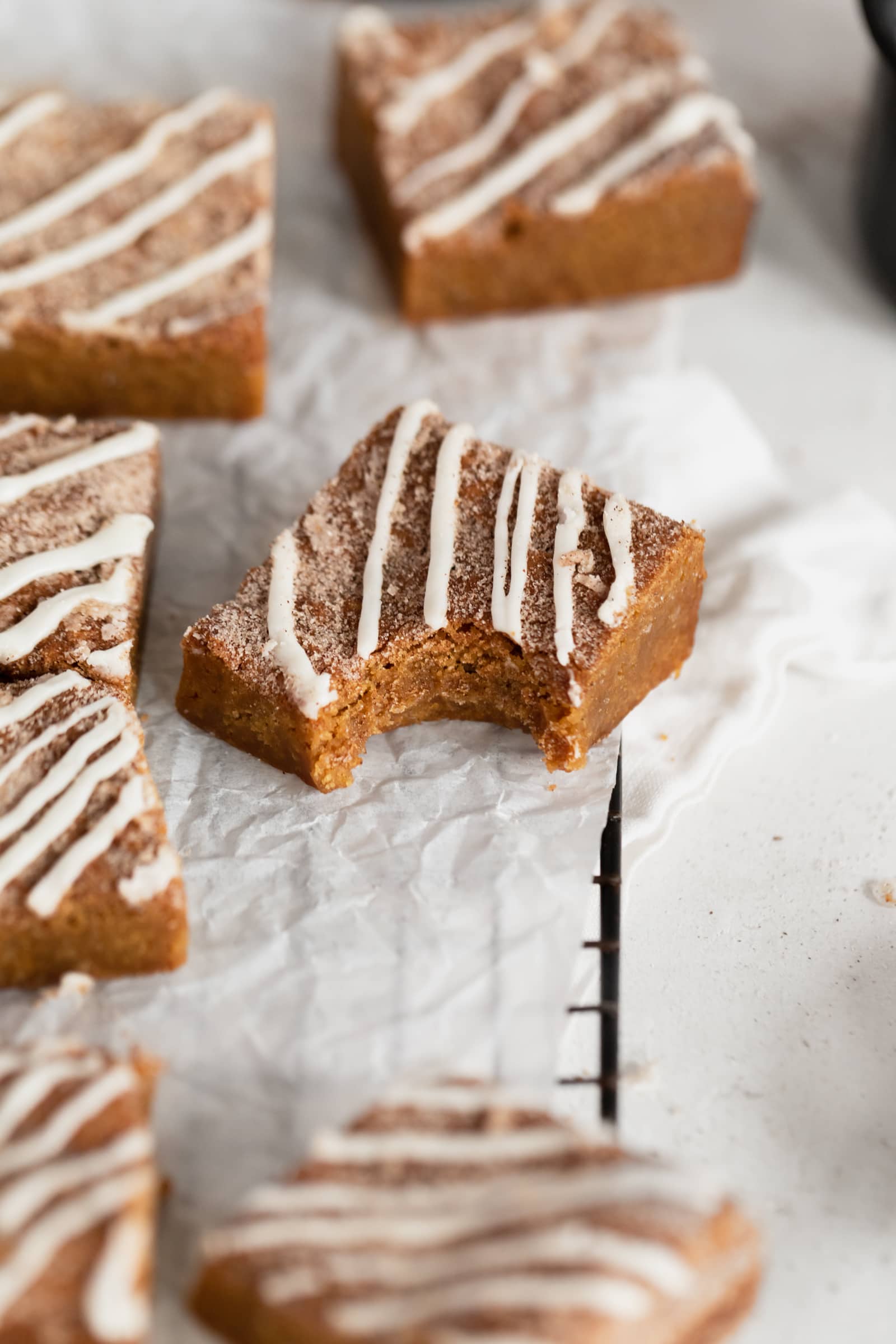 ginger molasses blondies with white chocolate drizzle
