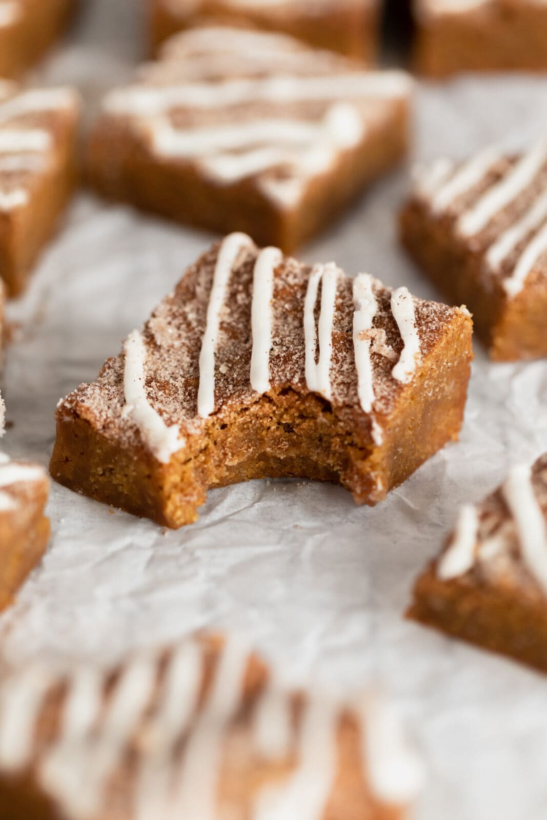 ginger molasses blondies with white chocolate drizzle