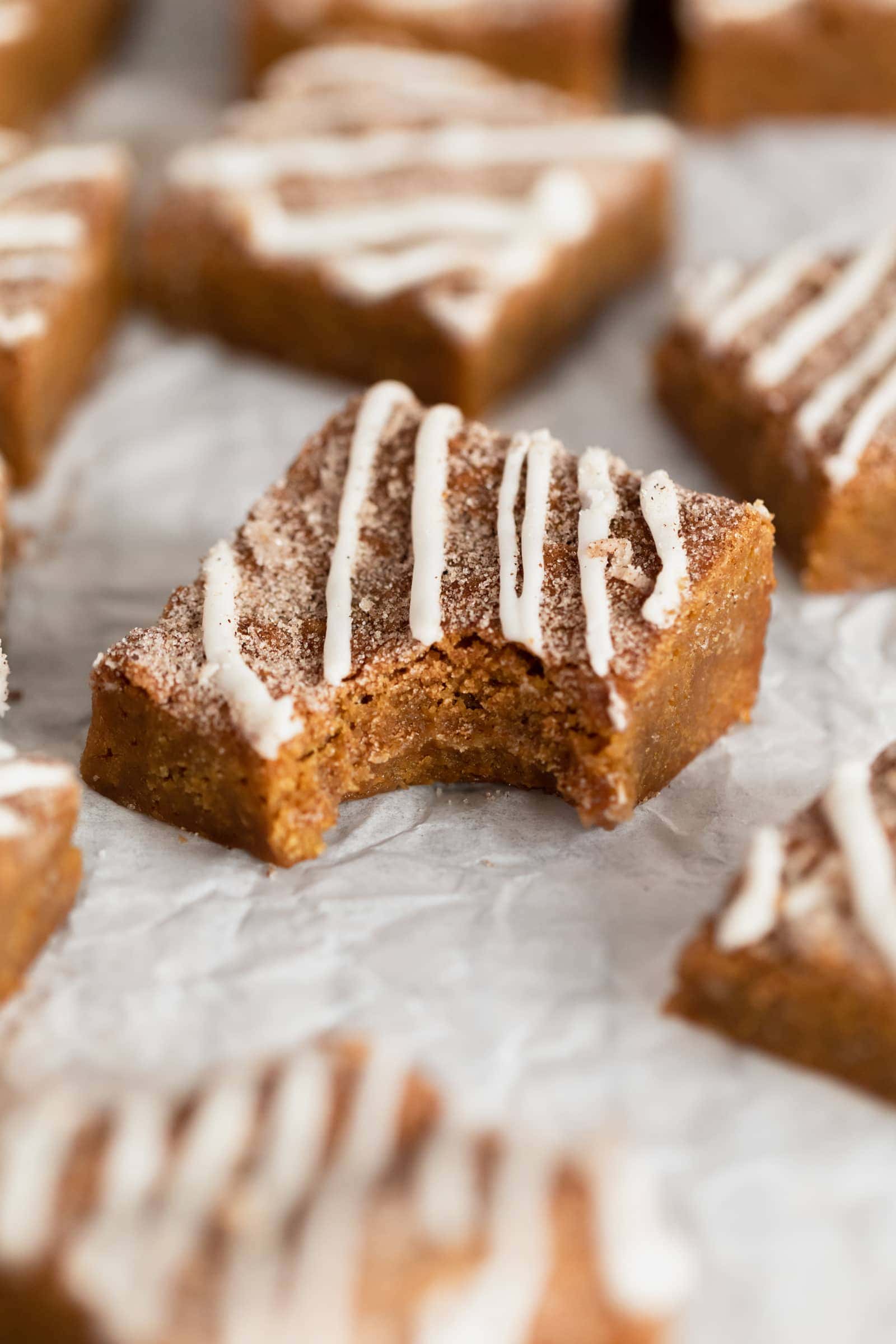 ginger molasses blondies with white chocolate drizzle