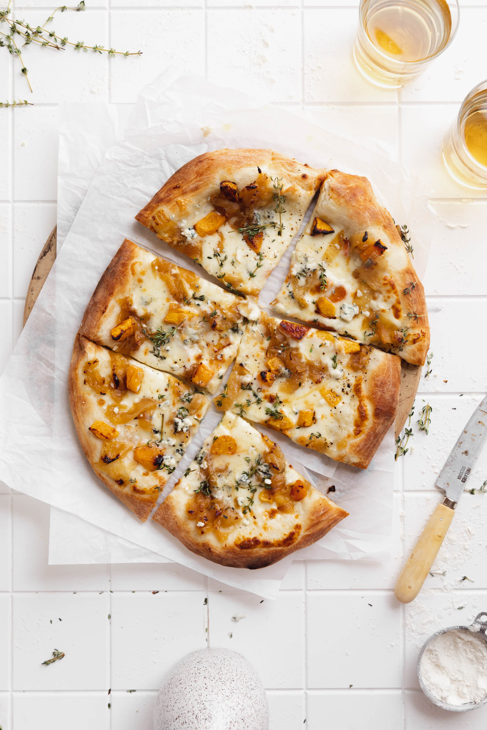 harvest pizza cut into slices