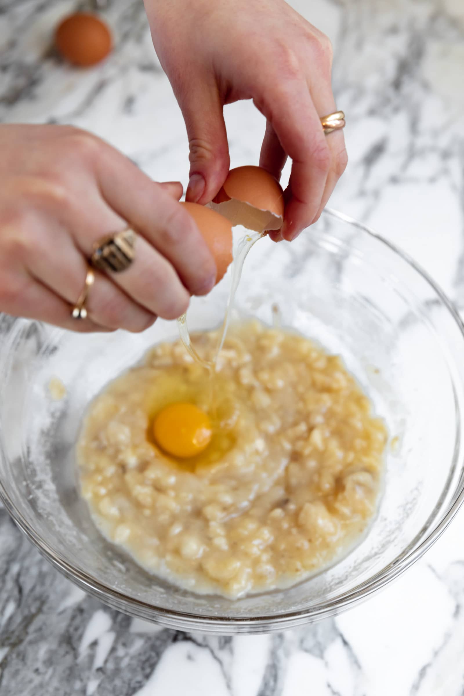 eggs cracking into banan bread