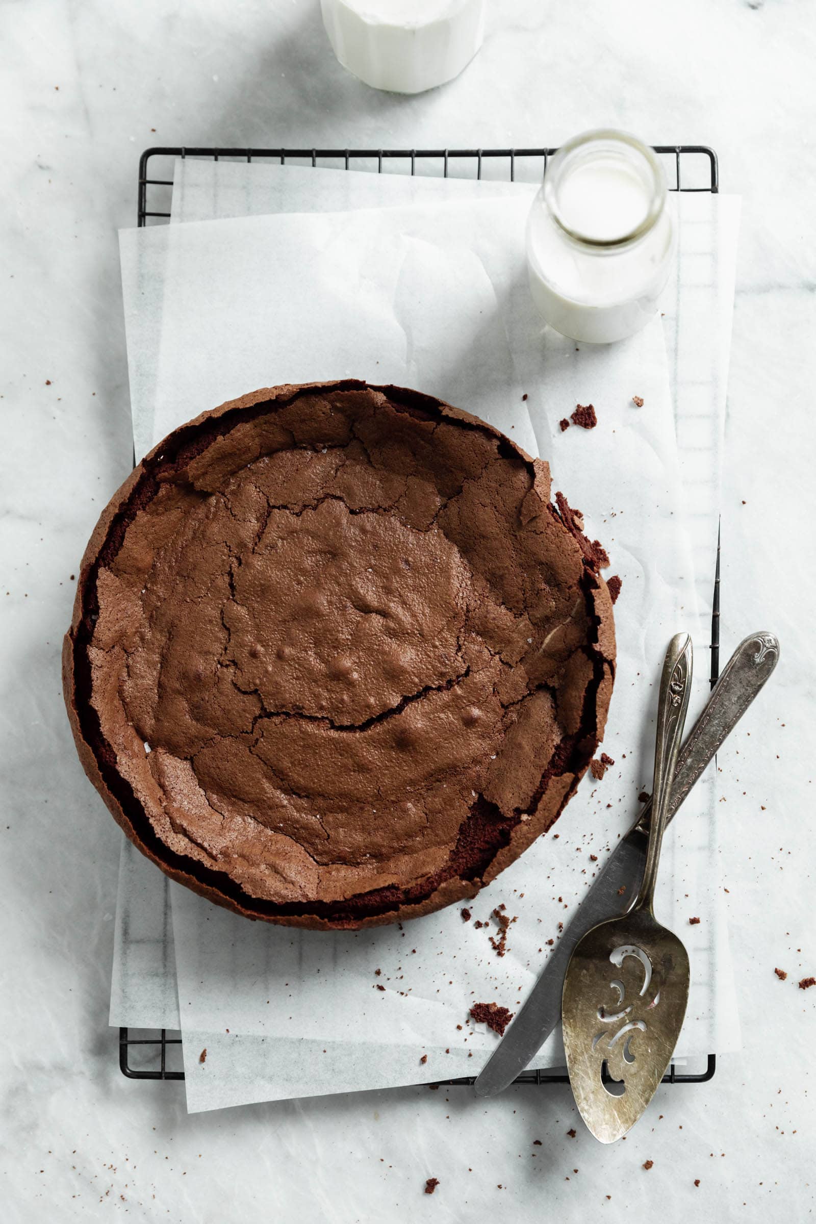 fallen chocolate cake on cooling rack