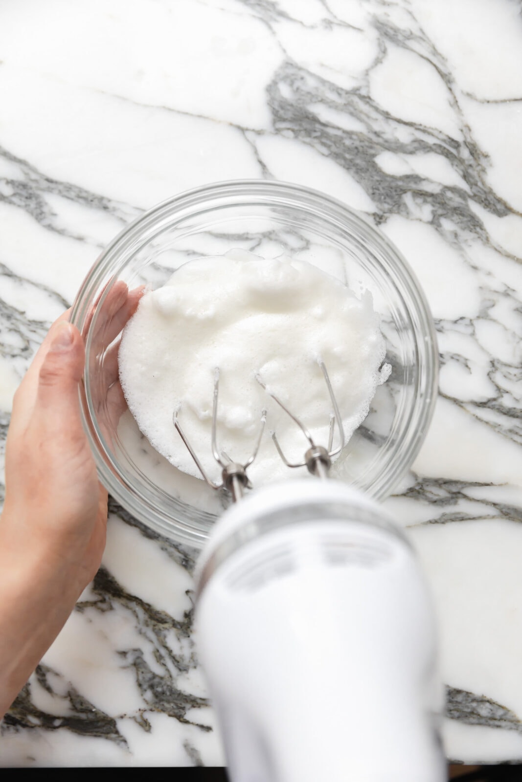 egg whites whipping with sugar