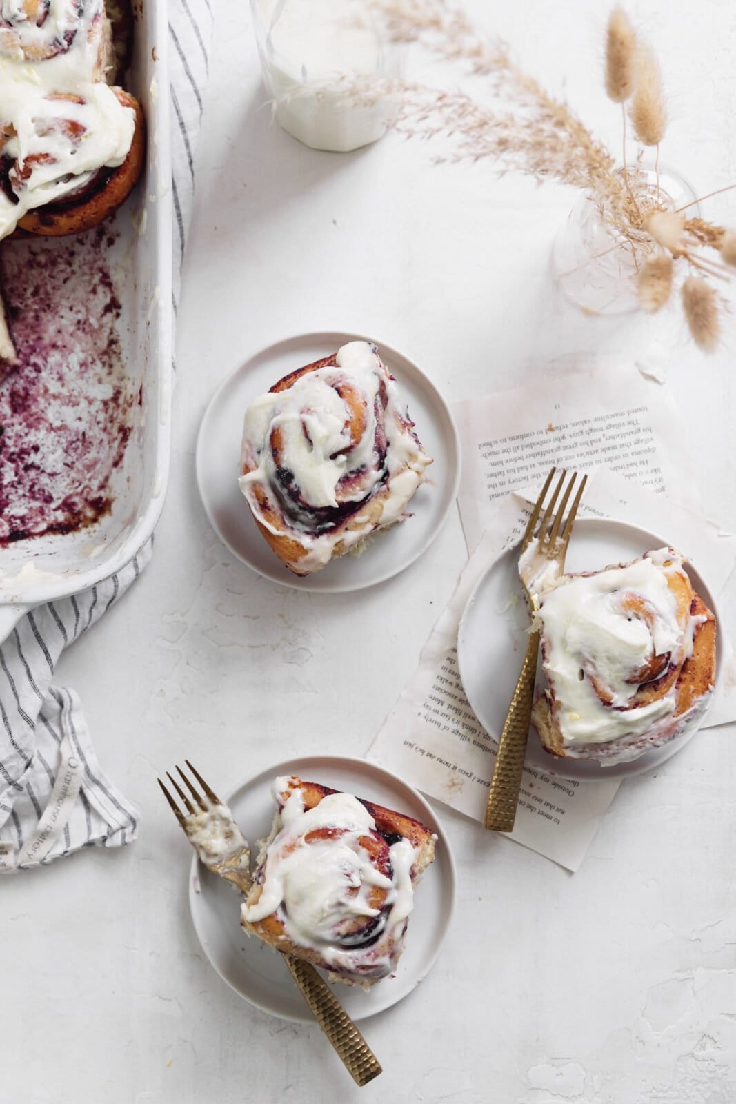 blueberry cinnamon rolls on plates
