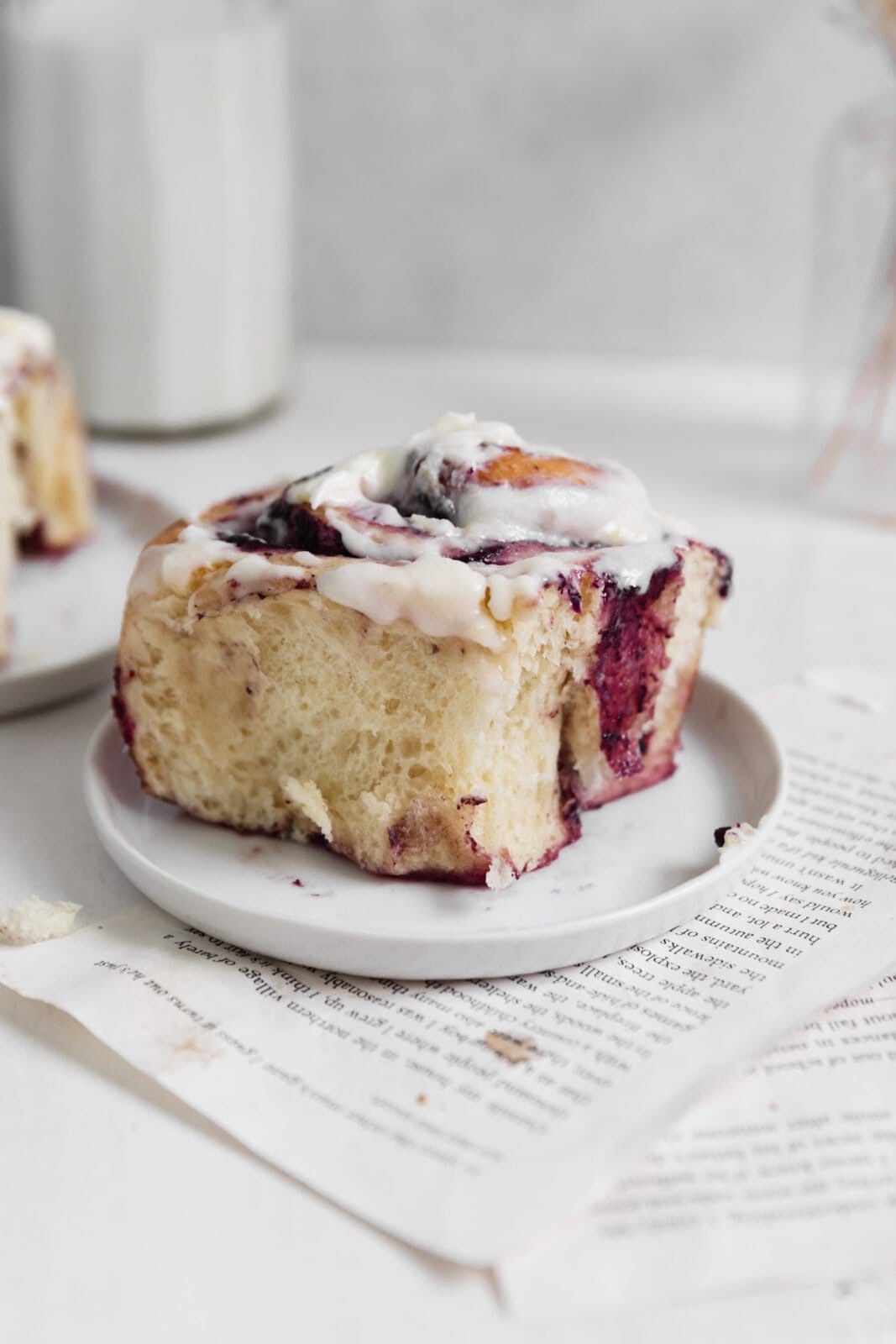 blueberry cinnamon roll on a plate