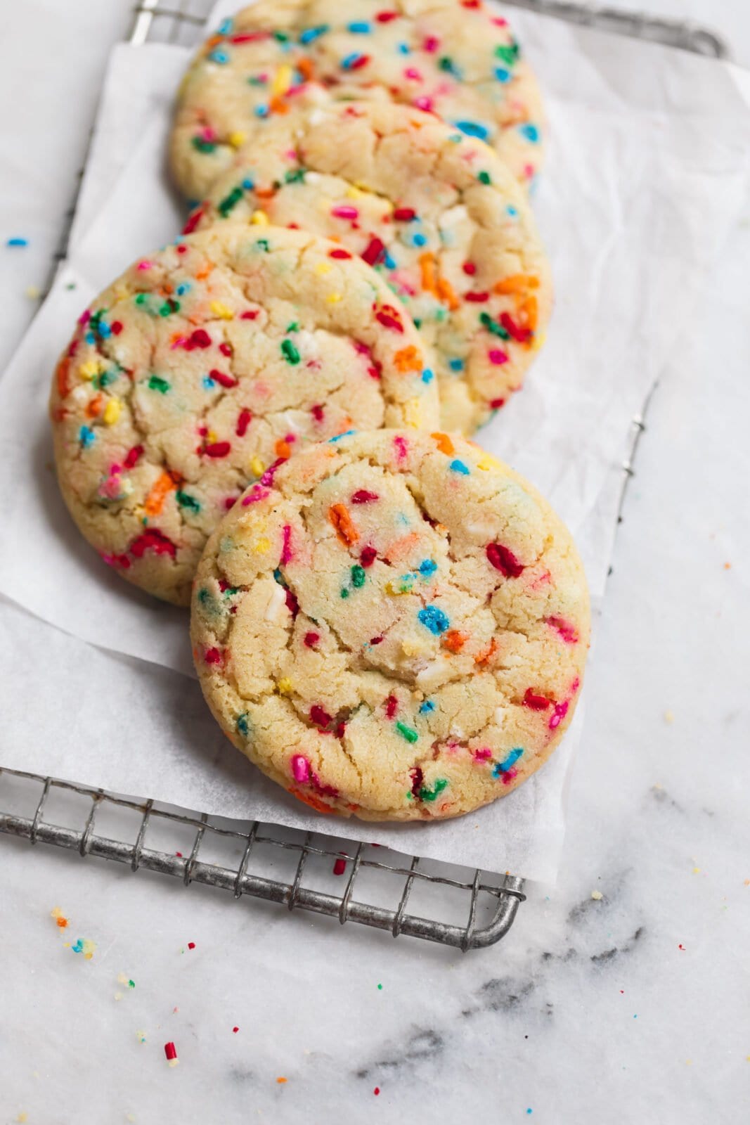 soft funfetti cookies on a cookie sheet