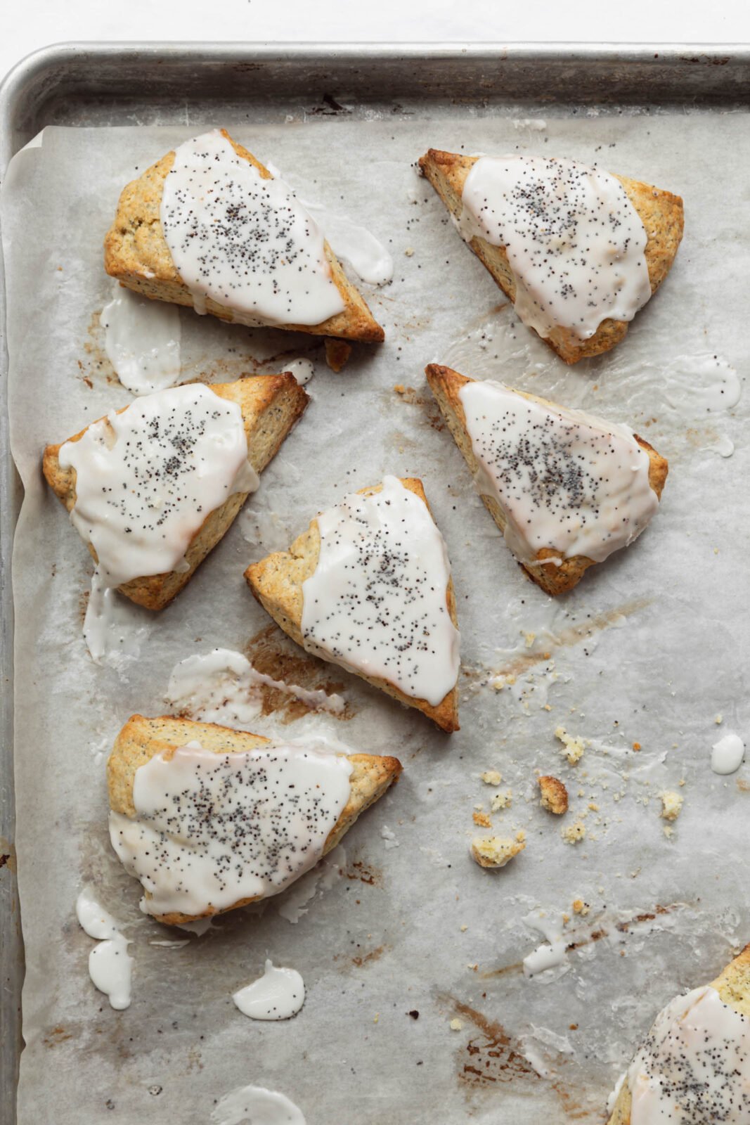 lemon poppyseed scones on a baking sheet