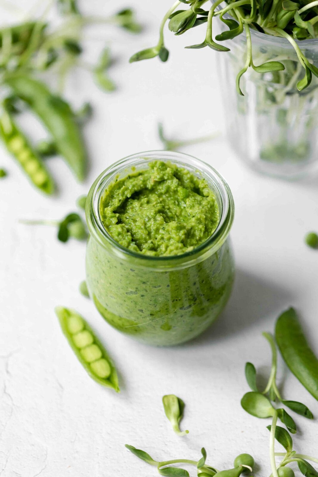 spring pea pesto in a jar with snap peas