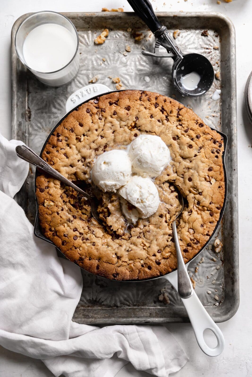 chocolate chip skillet cookie with ice cream and milk