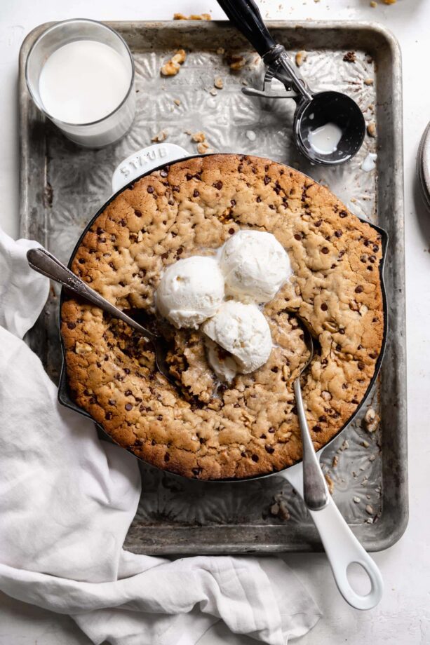 chocolate chip skillet cookie with ice cream and milk