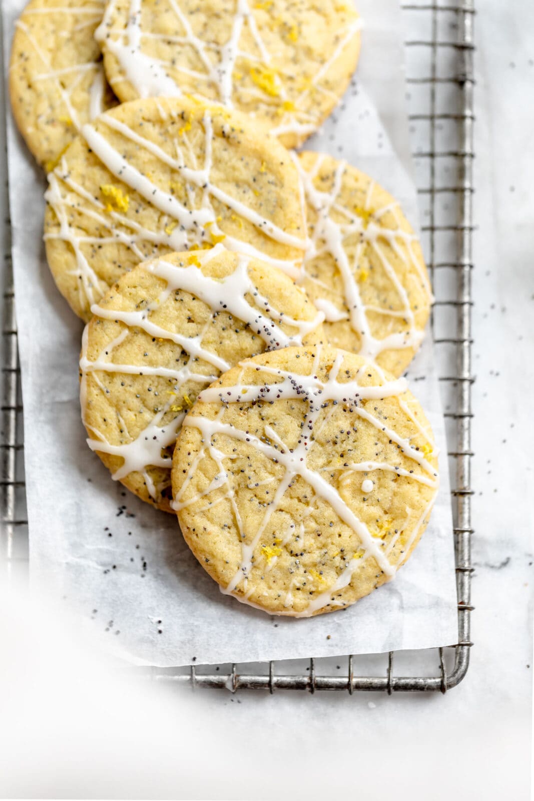 lemon poppy seed cookies on a cooling rack