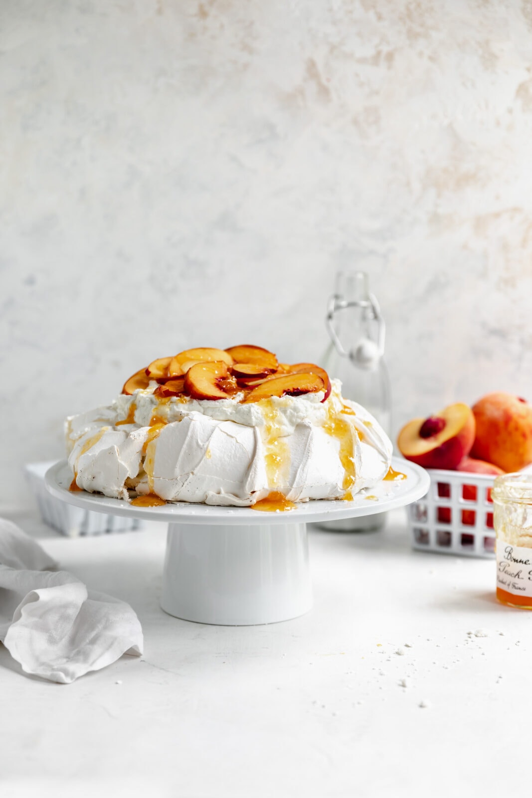 peaches and cream pavlova with fresh peaches