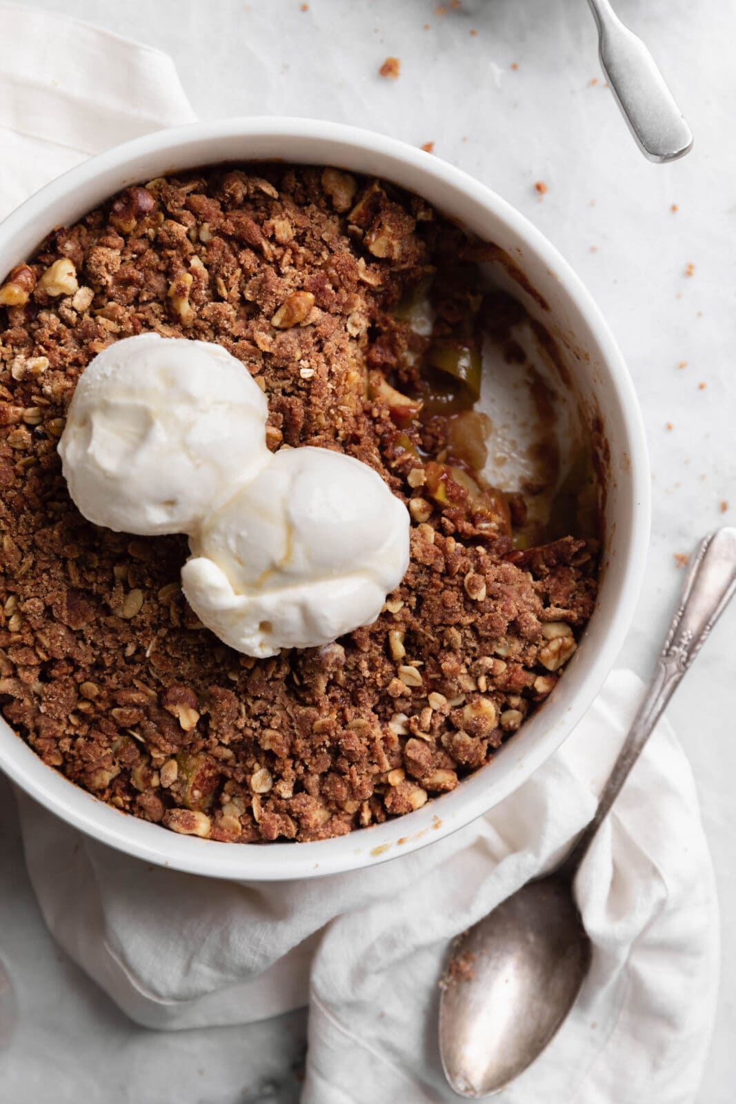 maple walnut apple crisp in a dish