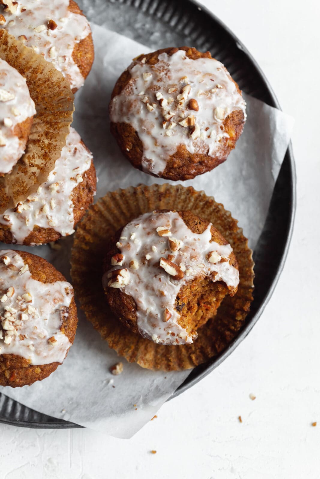 pumpkin carrot cake muffins with vanilla glaze
