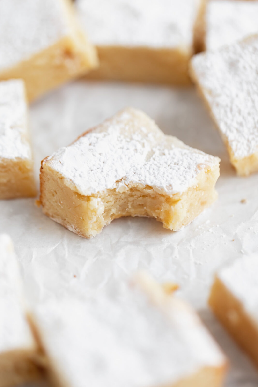 white chocolate brownies with a bite taken out