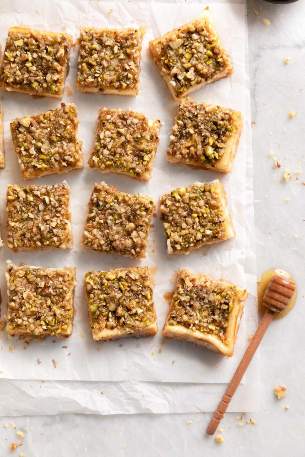 baklava cheesecake bars with honey stick