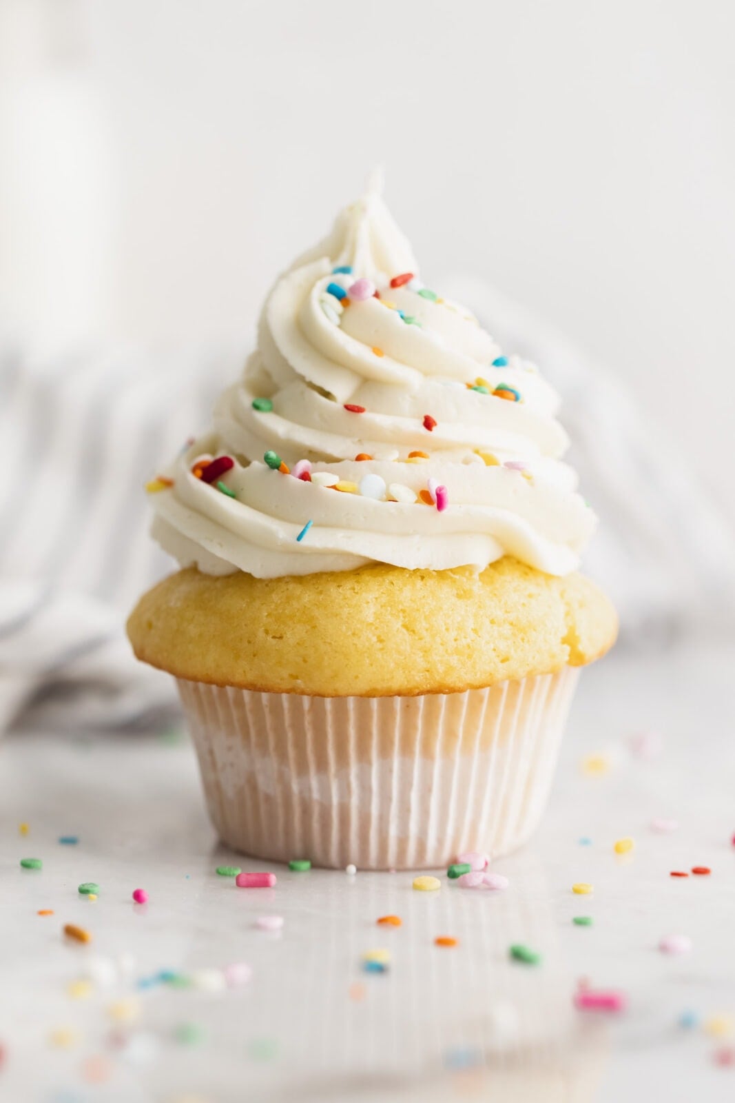 single serve vanilla cupcake with vanilla frosting
