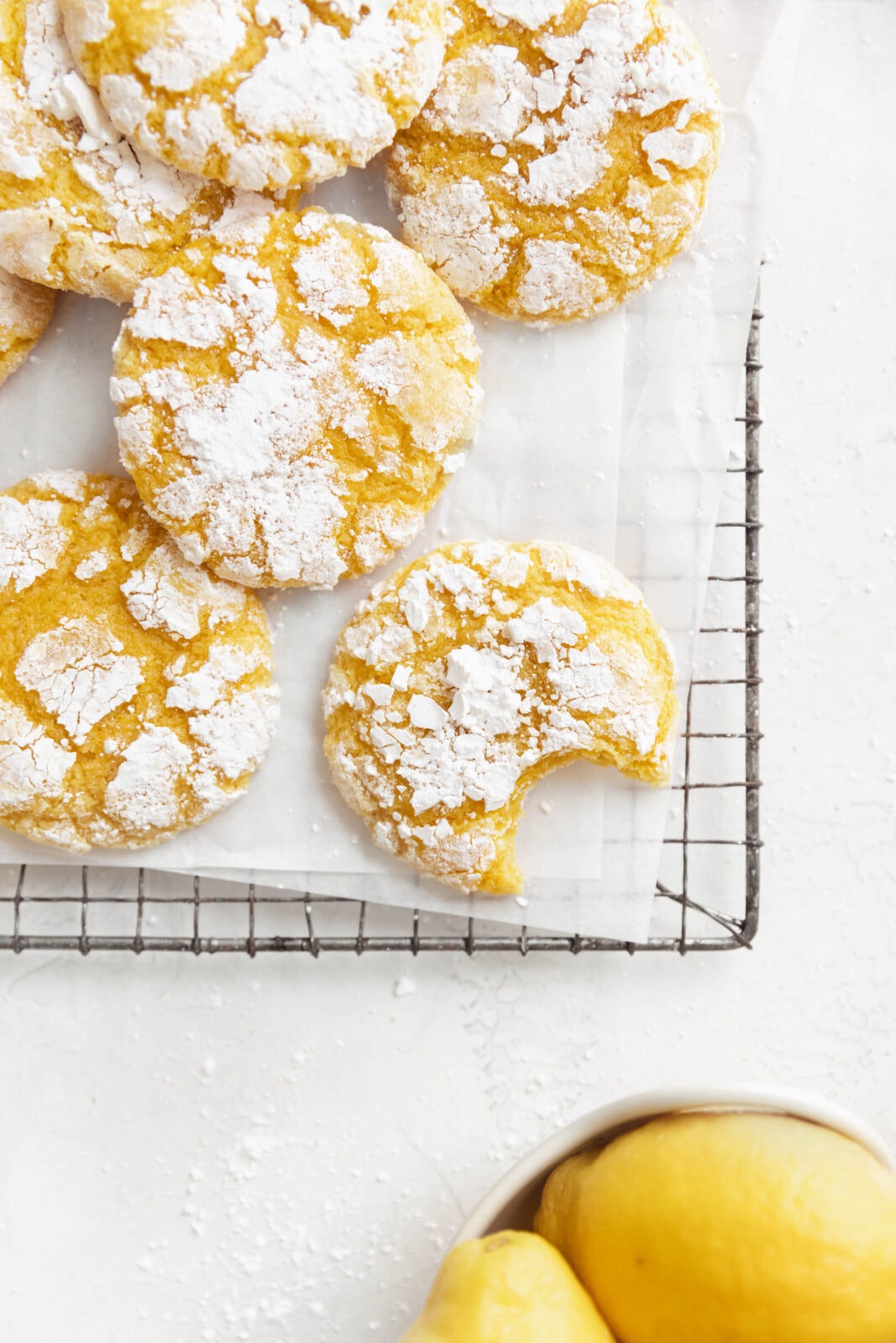 lemon crinkle cookies on a cooling rack
