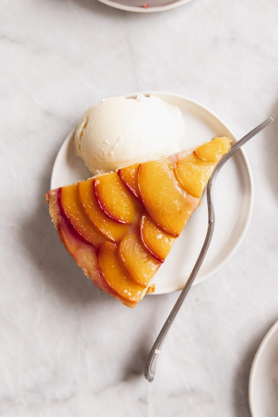 slice of peach upside down cake