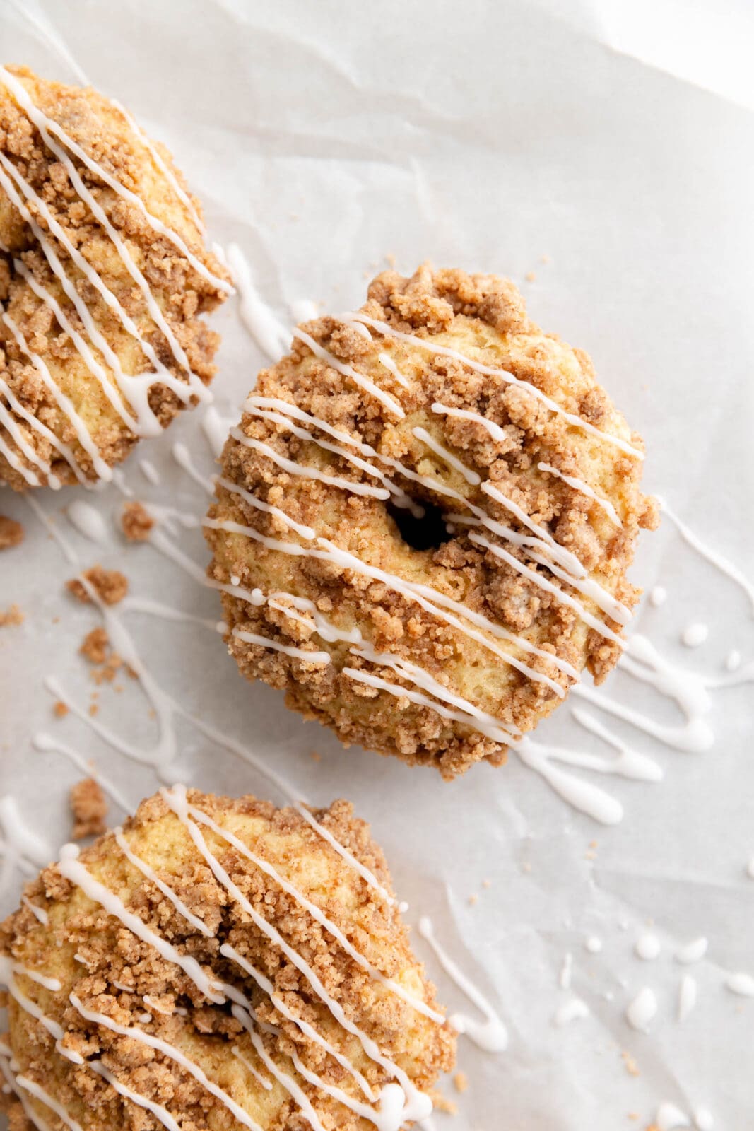 coffee cake donuts with cinnamon streusel and vanilla glaze