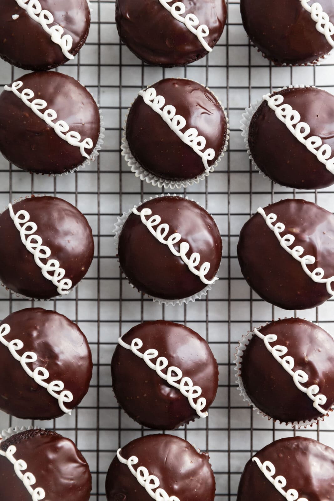 homemade hostess cupcakes on a cooling rack