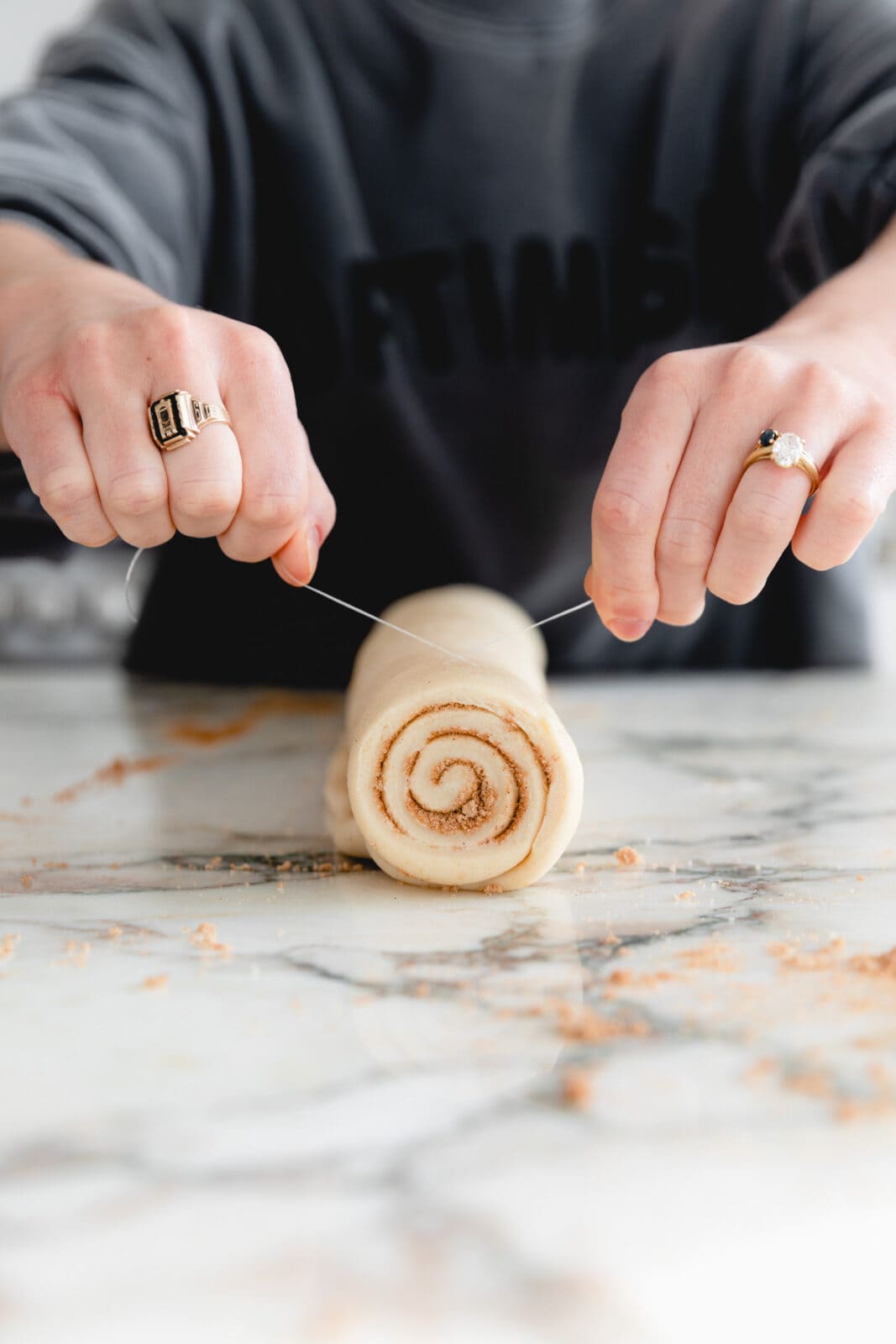 cutting cinnamon rolls with floss
