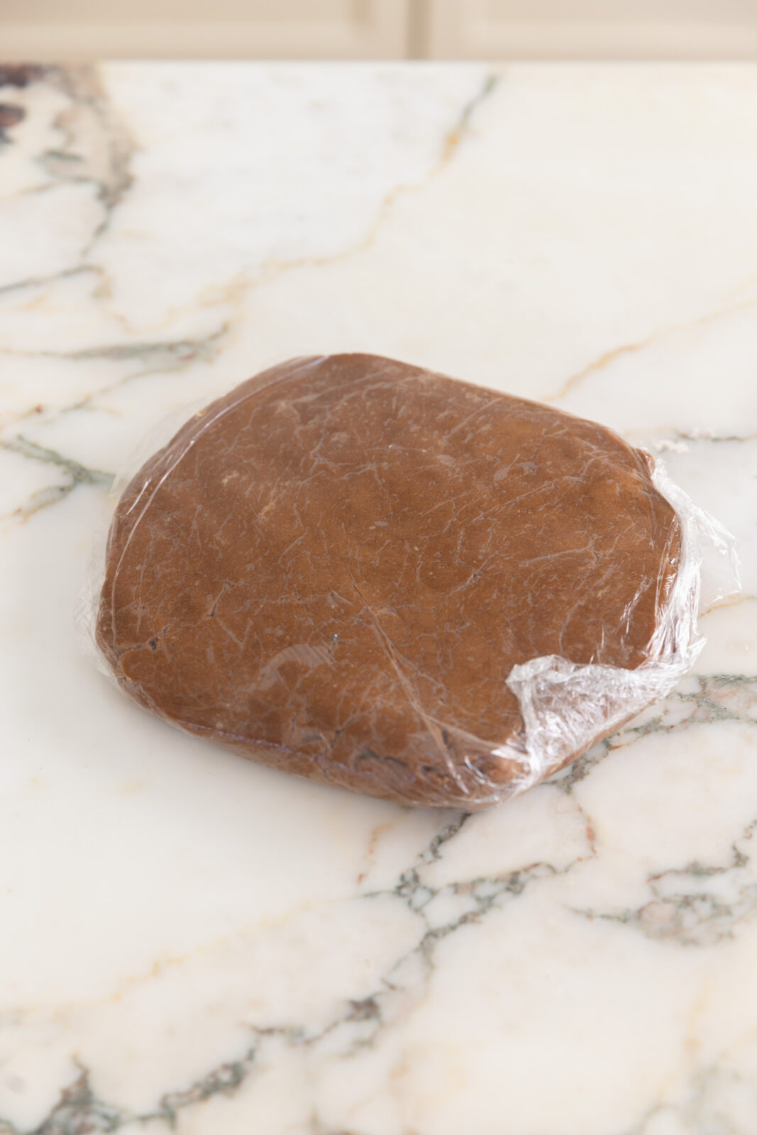 dough wrapped in plastic wrap