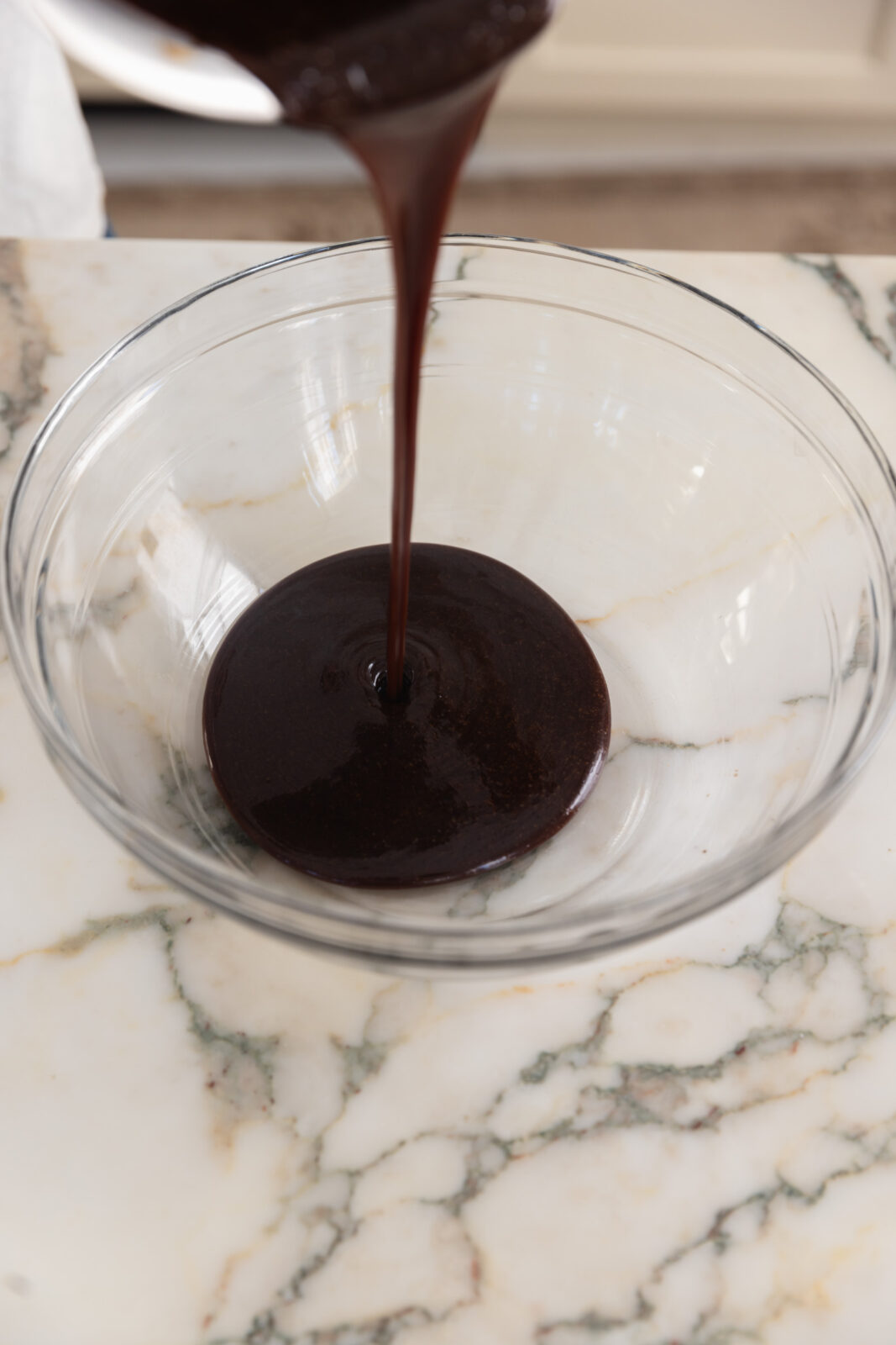 cooked molasses, shortening and sugar in a bowl
