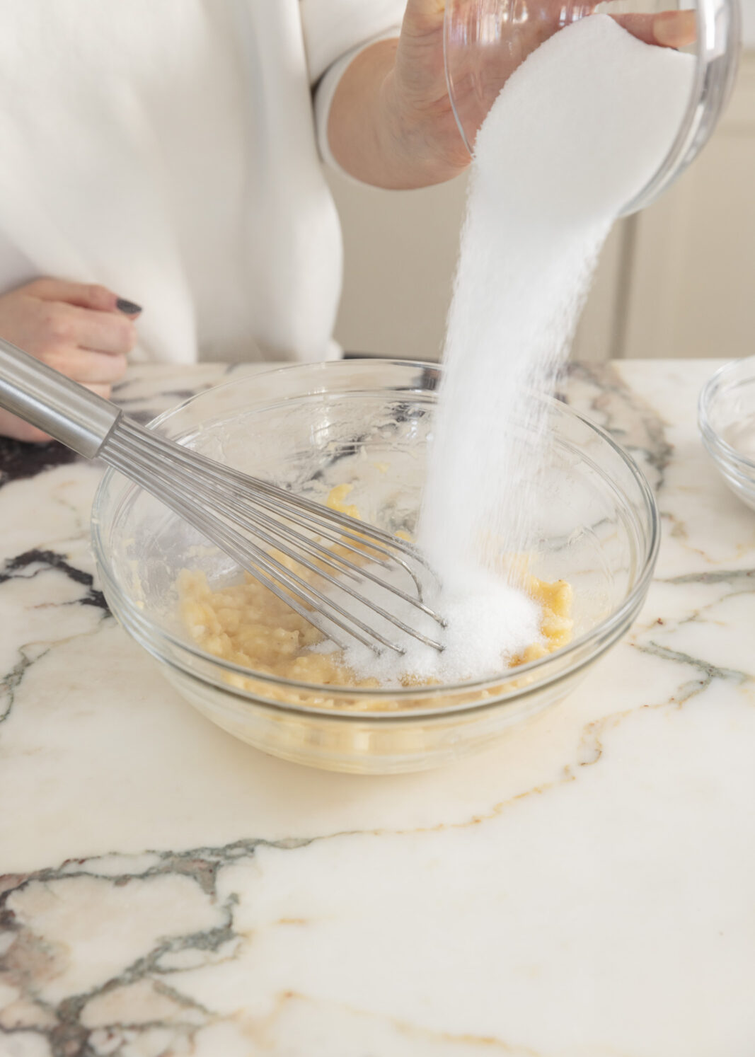 sugar going into bowl