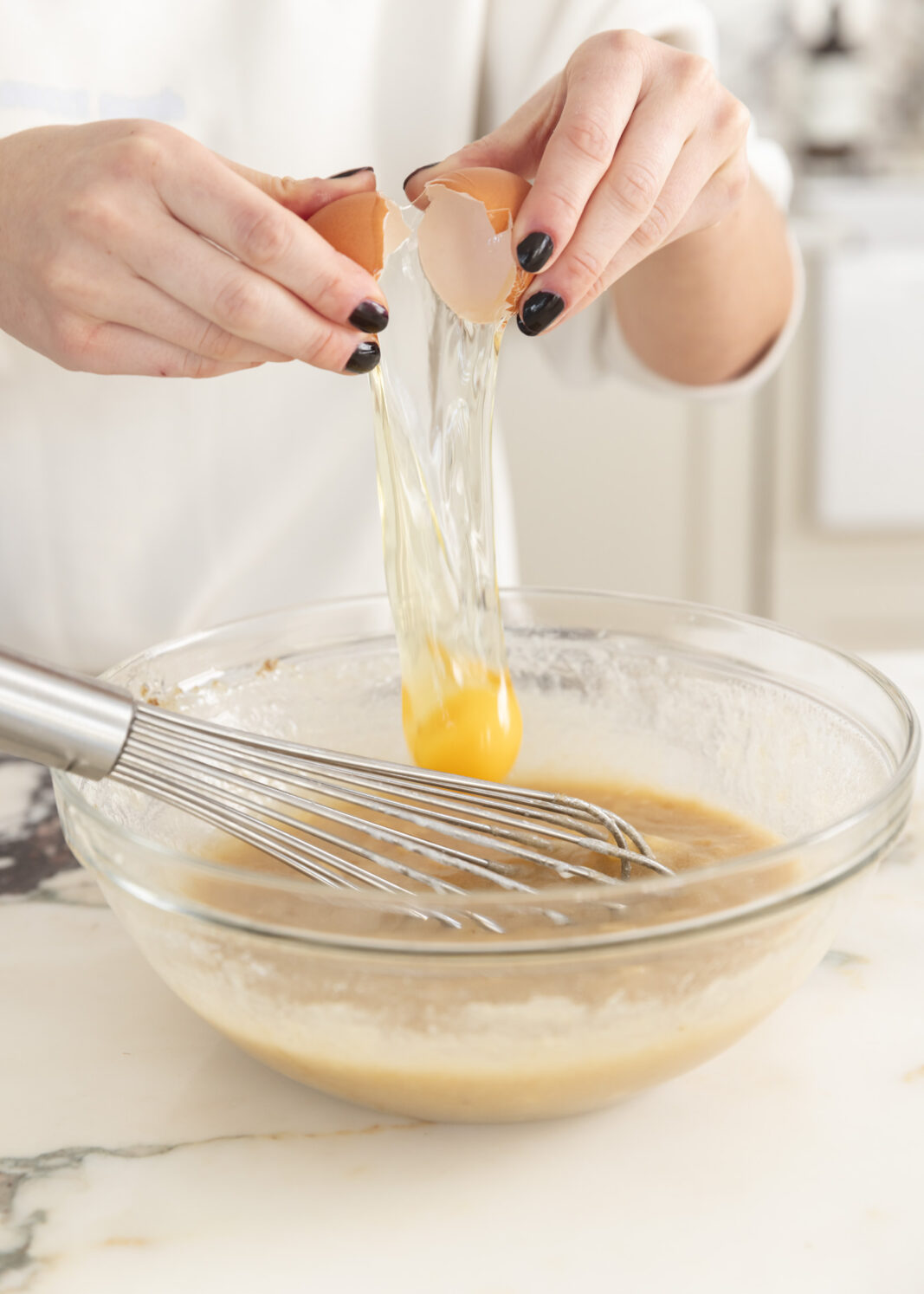 eggs going into bowl
