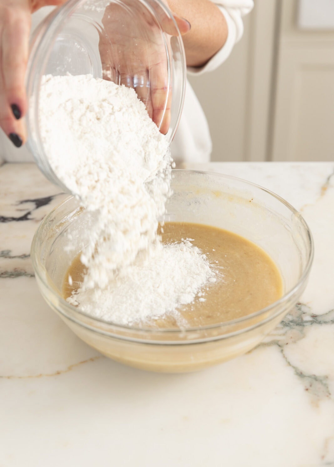 dry ingredients going into bowl