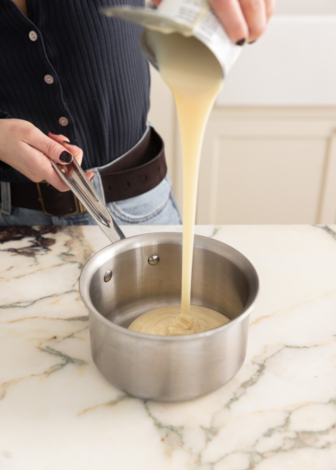 sweetened condensed milk in pot
